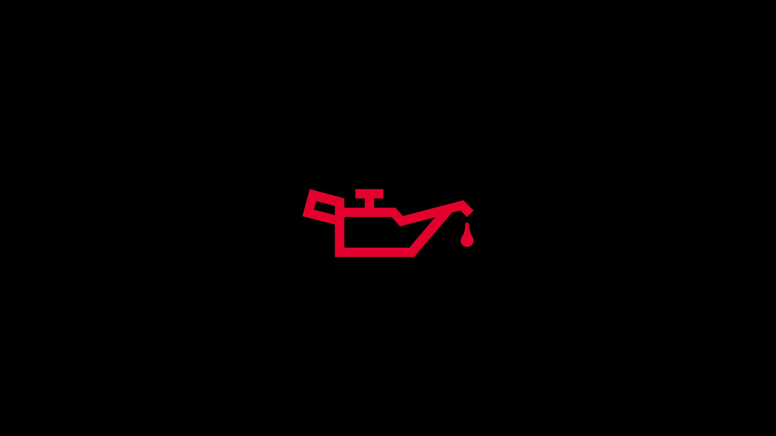 Ein rotes Symbol auf schwarzem Hintergrund zeigt eine Ölkannengrafik mit einem Tropfen Öl. Dies deutet normalerweise auf ein Problem mit dem Motoröl eines Fahrzeugs hin.