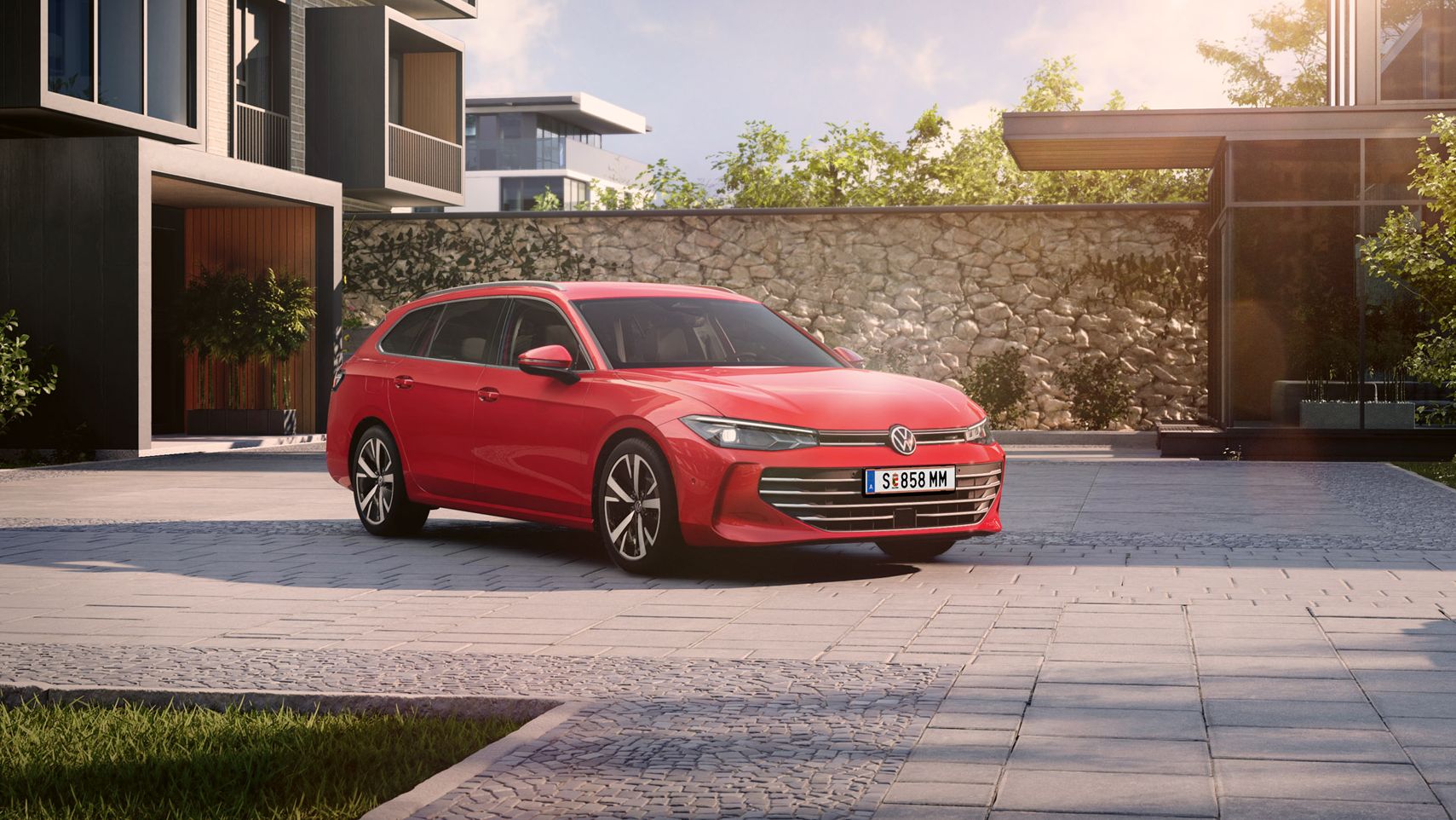 Roter VW Passat steht im Innenhof einer modernen Wohnanlage.