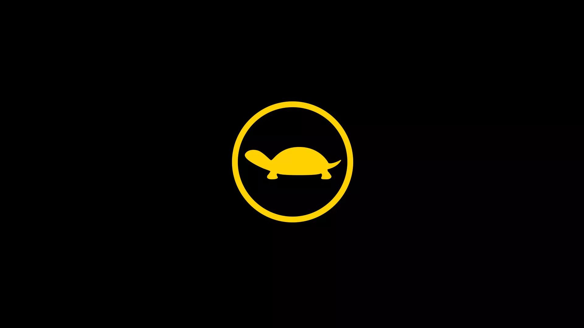 Eine gelbe Schildkröten-Symbol in einem gelben Kreis vor einem schwarzen Hintergrund.