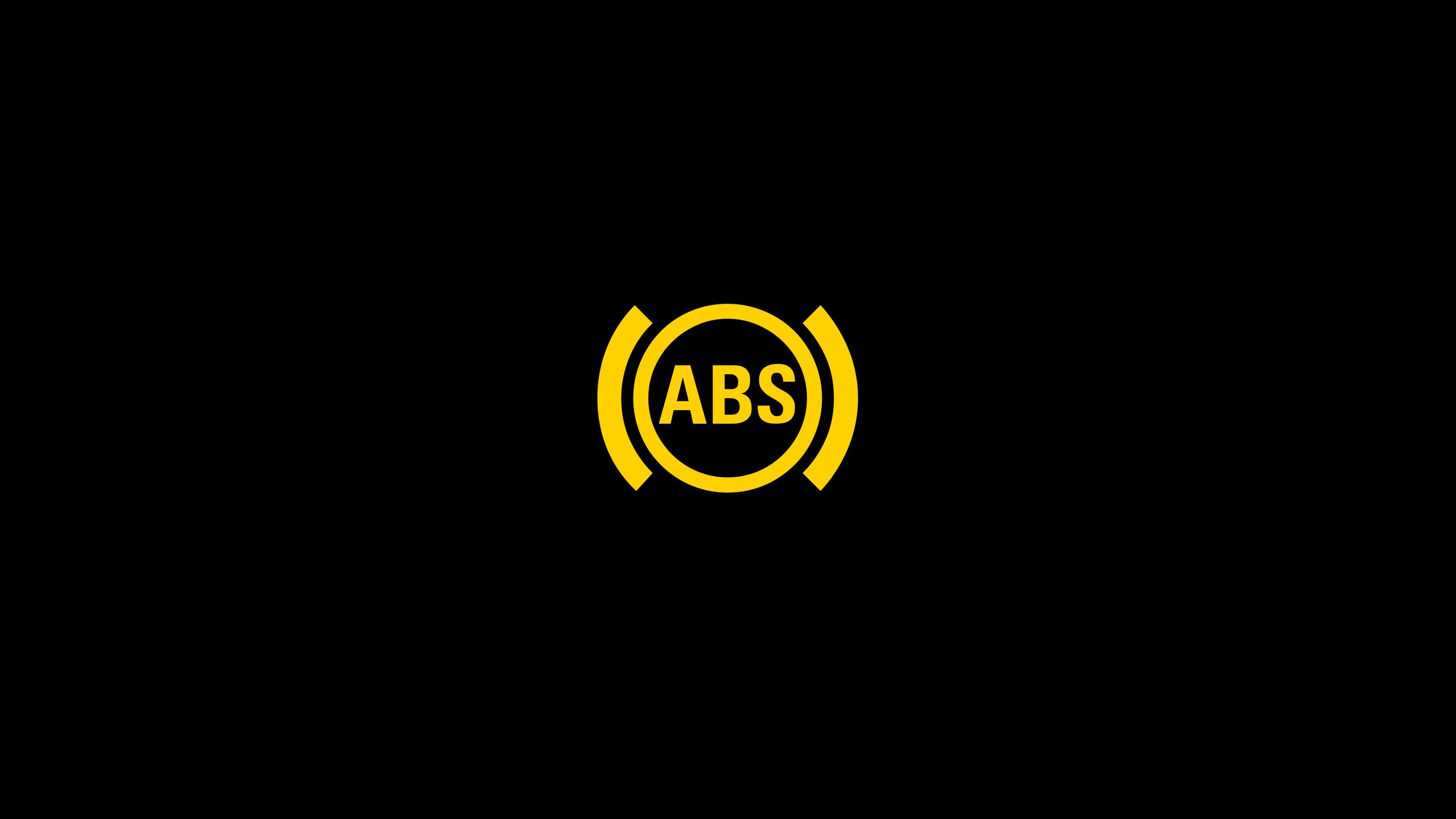 Gelbes ABS-Symbol auf schwarzem Hintergrund. Das Symbol zeigt, dass das Antiblockiersystem aktiviert ist oder ein Problem damit vorliegt. ABS steht für "Anti-Blockier-System".