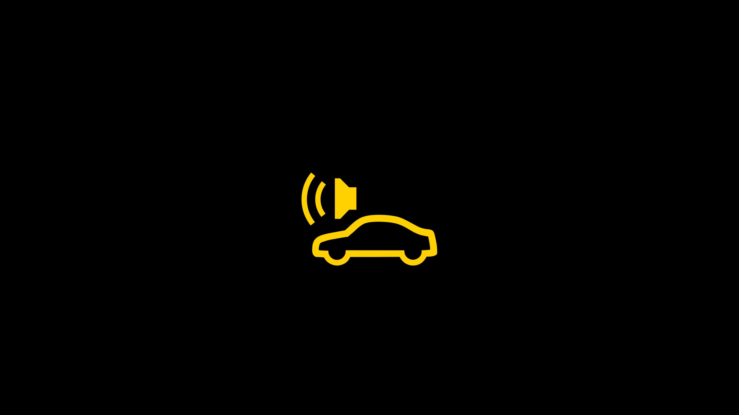 Ein gelbes Symbol zeigt einen Auto-Umriss mit einem Lautsprechersymbol darüber. Es könnte auf eine Audiofunktion oder Sprachsteuerung im Auto hinweisen. Der Hintergrund ist schwarz.