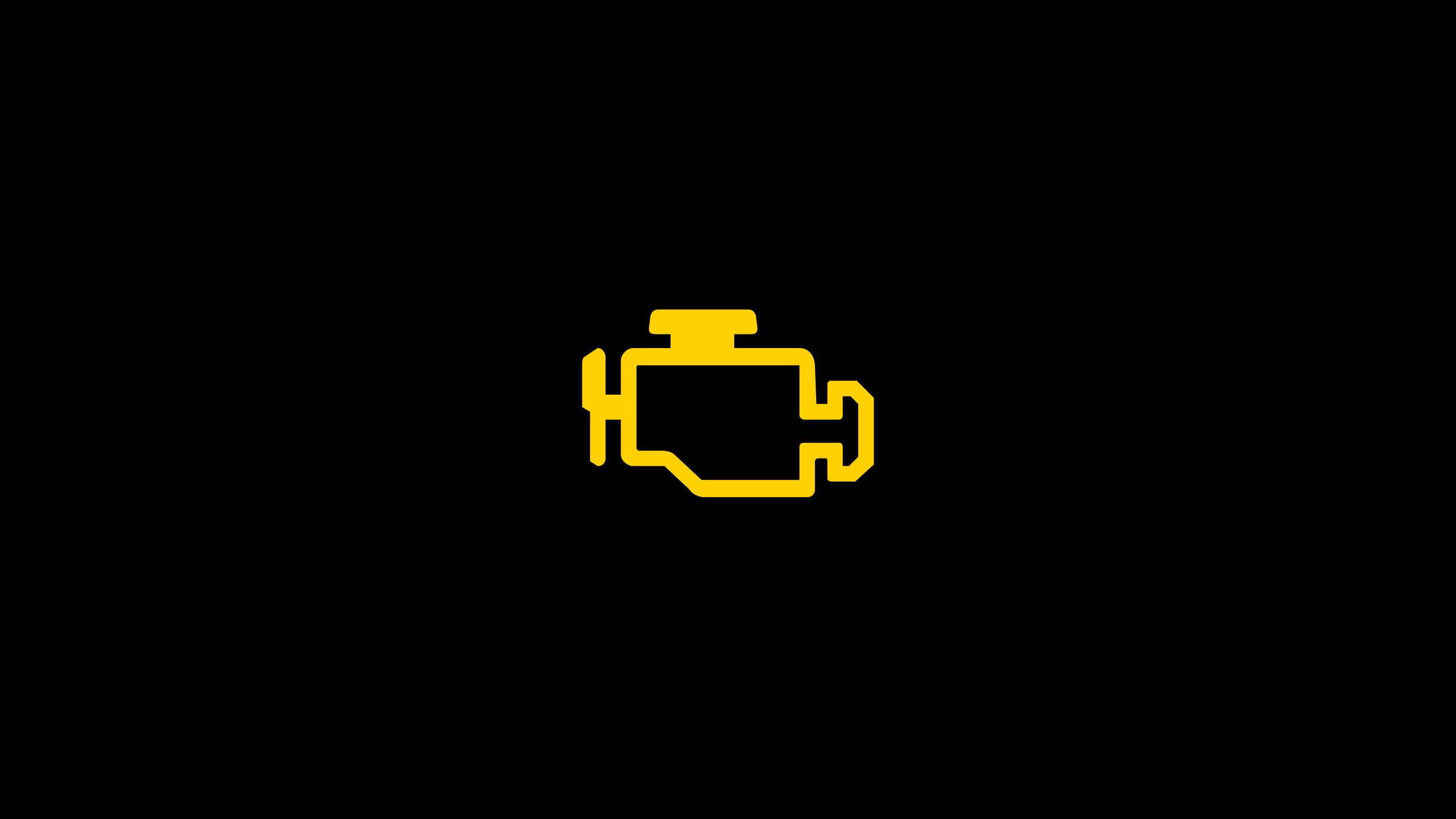 Gelbes Motor-Symbol auf schwarzem Hintergrund. Dieses Symbol stellt die Motorkontrollleuchte dar und weist auf ein mögliches Problem mit dem Motor hin.