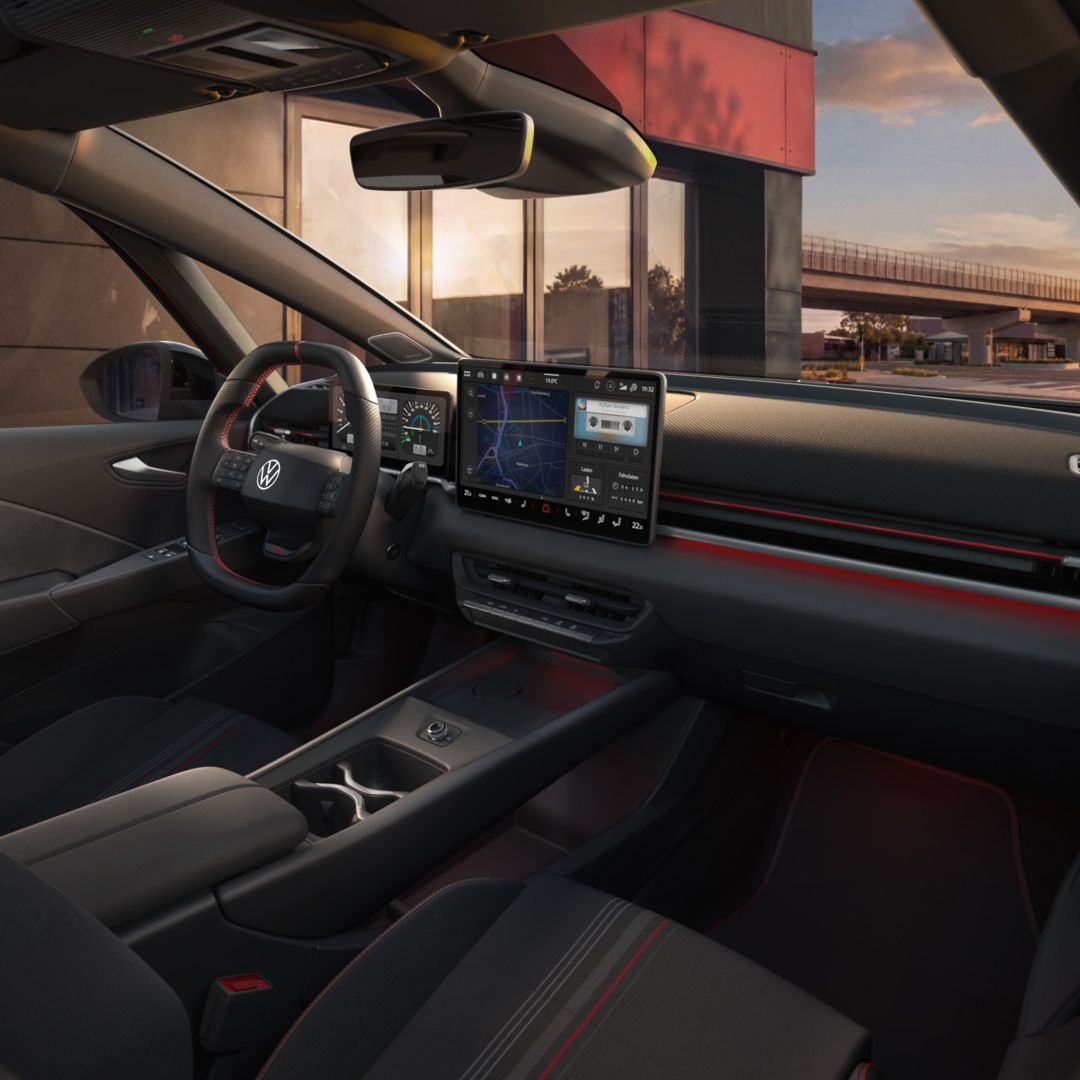 [AI-modified] – Blick auf Infotainment-System und Dekor eines VW ID.3 GTI kurz vor Sonnenuntergang