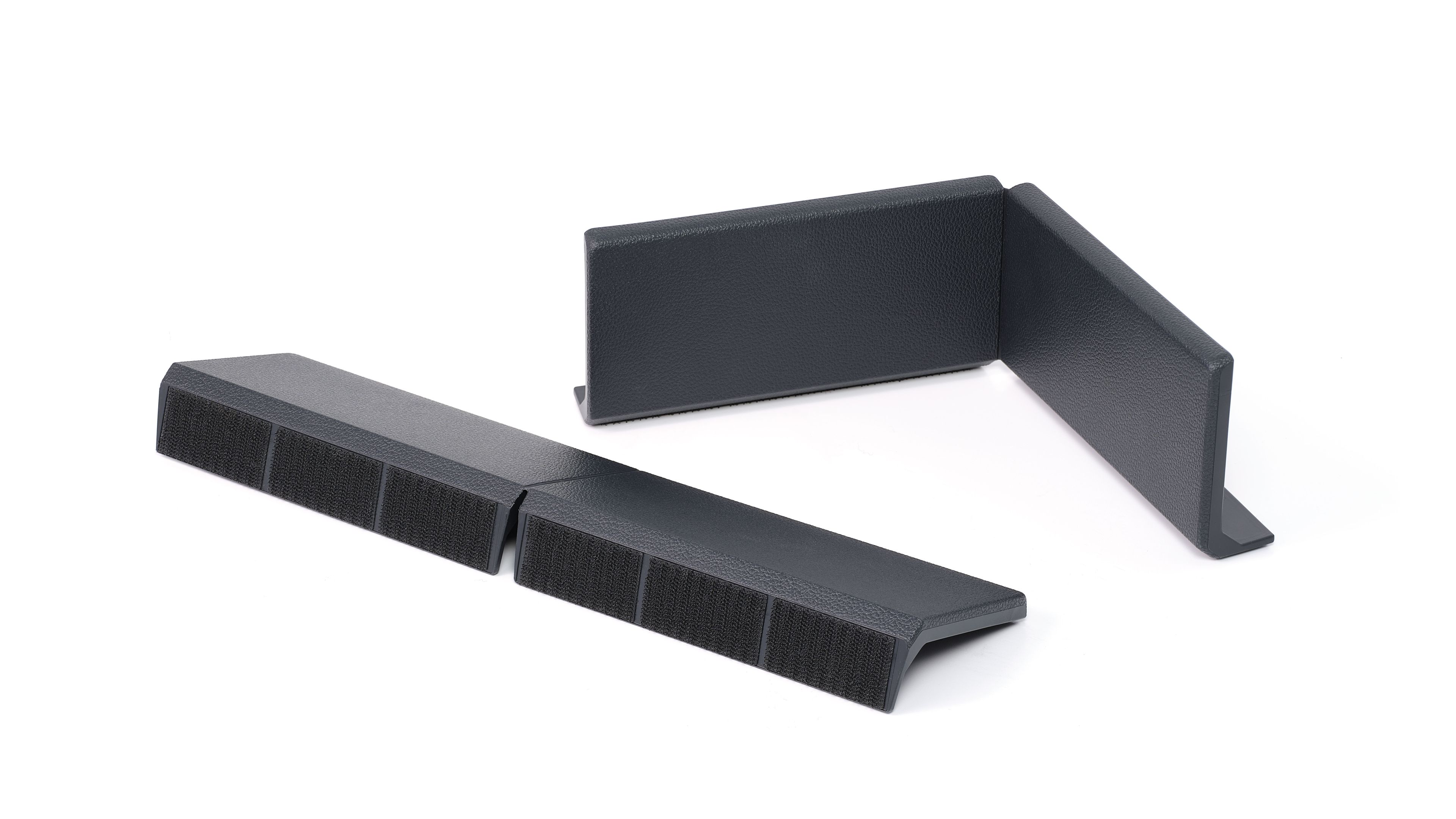 Volkswagen Original Cargo Elemente mit Klettsystem zur Fixierung am Kofferraumteppich.