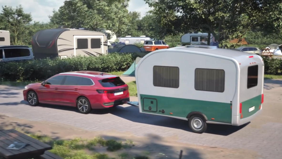 Ein roter VW Passat lenkt einen Anhänger und nutzt Trailer Assist