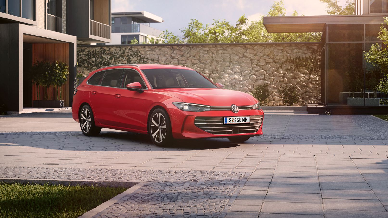 Roter VW Passat steht im Innenhof einer modernen Wohnanlage.