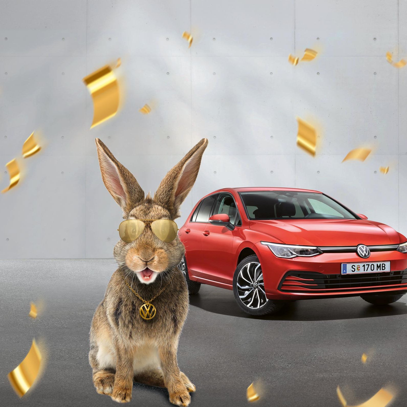 Roter VW Golf Rabbit mit Hasen im Vordergrund 